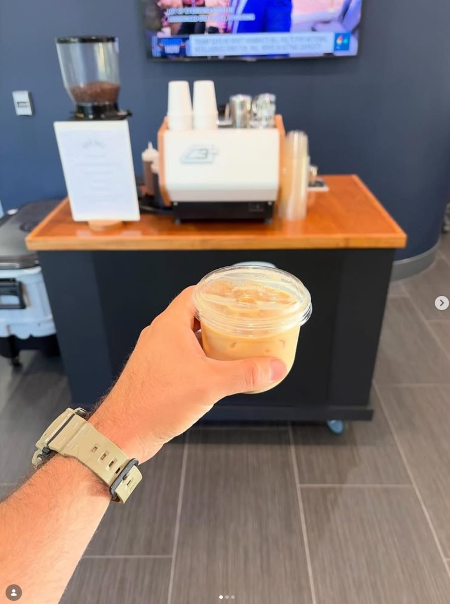 Break Coffee Cart barista serving at a Hylant office event
