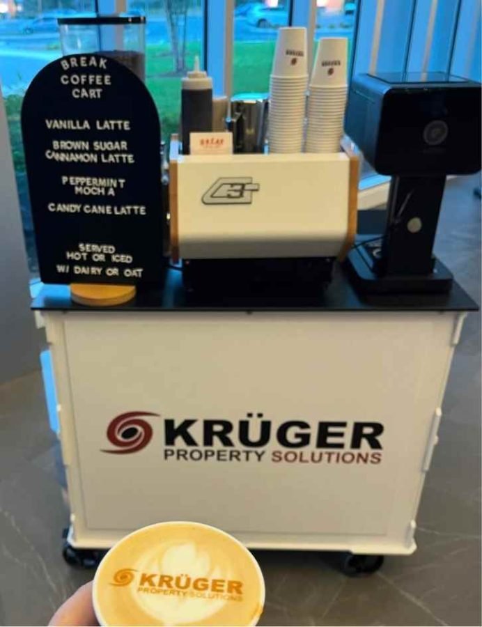 Break Coffee Cart with Kruger Property Solutions branding at a corporate office event