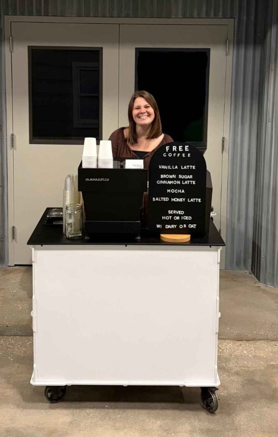Sarah serving craft espresso from the Break Coffee Cart mobile bar