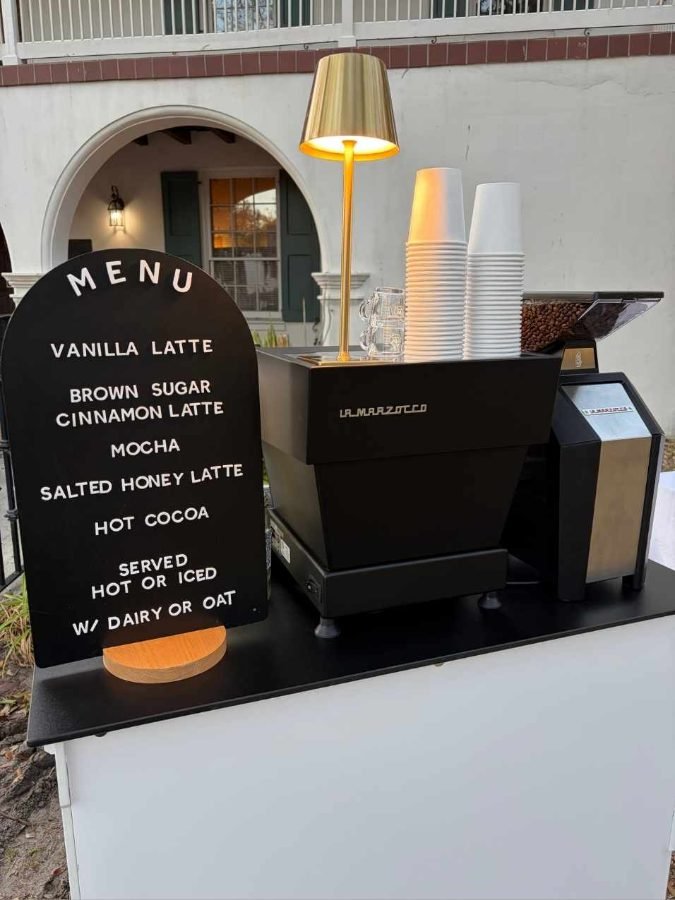 Break Coffee Cart espresso bar with warm mood lighting set up at an evening wedding